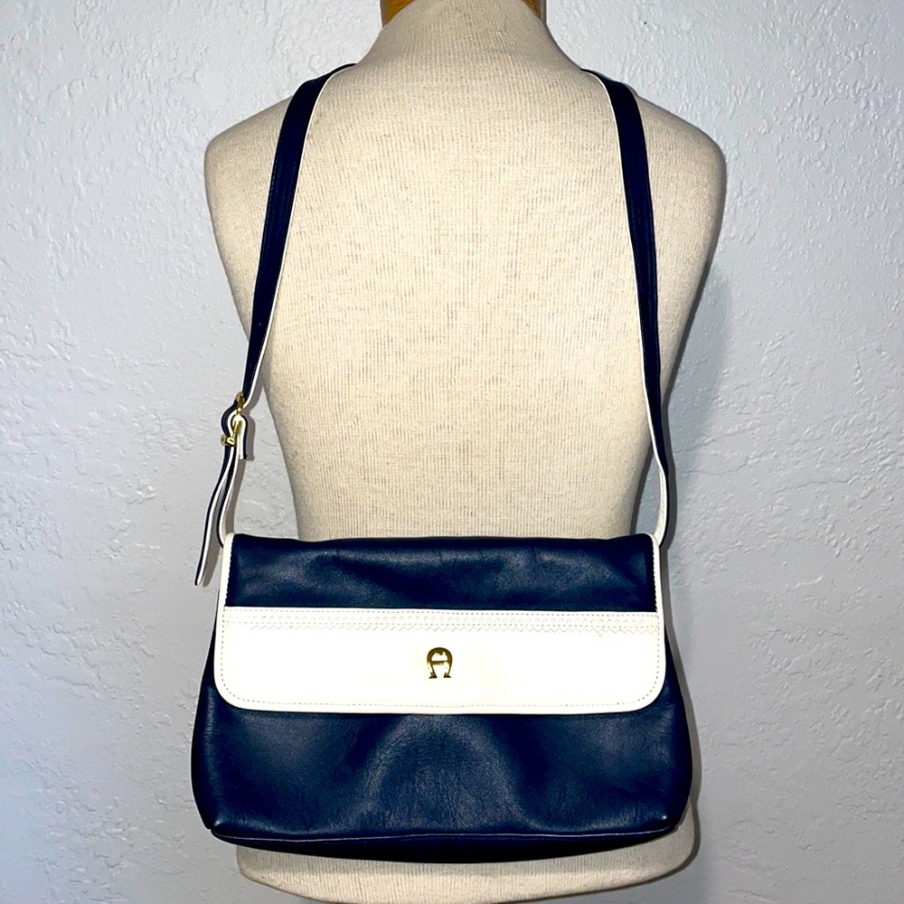 Epitome of Classic! Aligner Blue Laser cut classy purse  to wear at your best!